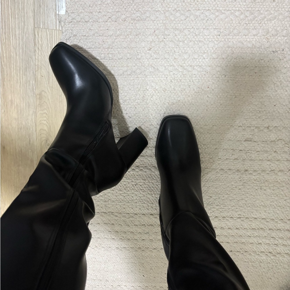 Tall black boots